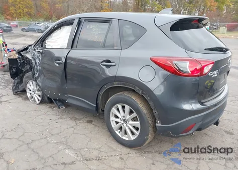 2014 Mazda Cx-5 Touring z USA, uszkodzony, nr VIN JM3KE4CY4E0411631